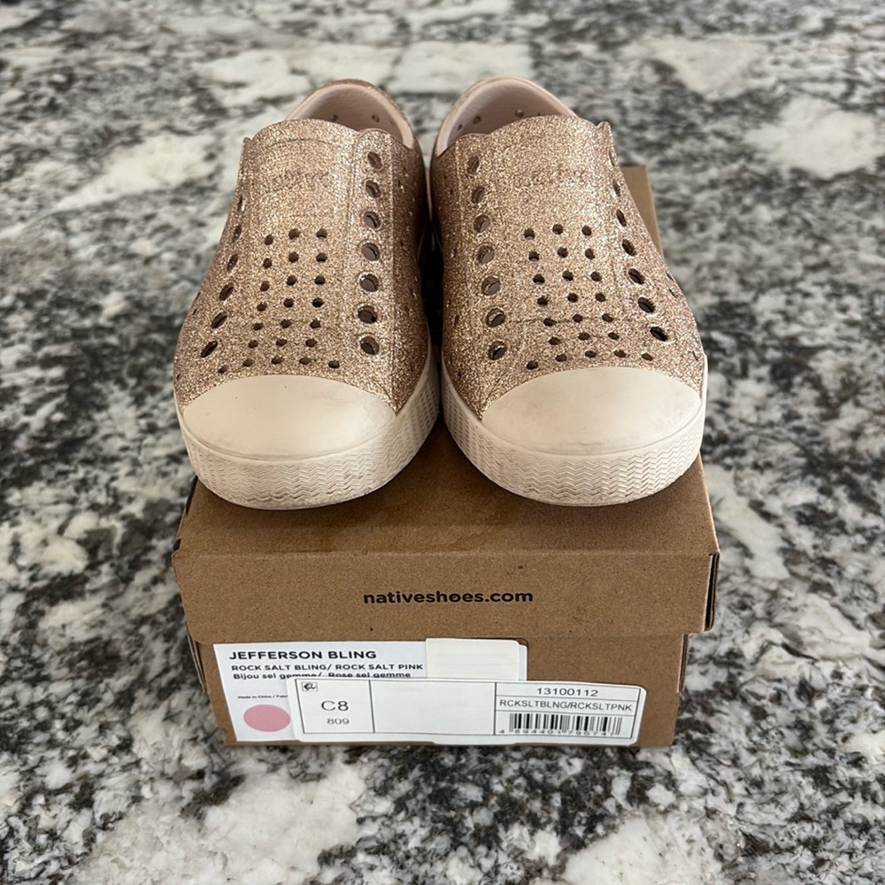 Gold sparkly Native slipons
